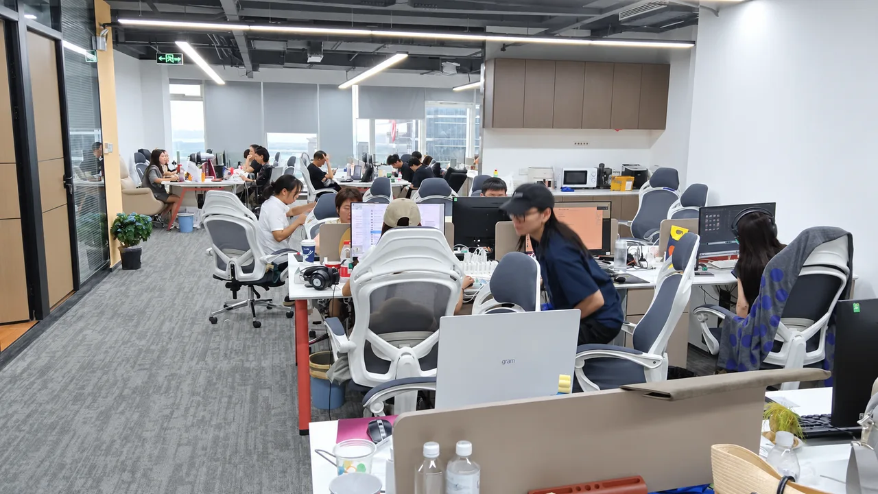 Xunding colleagues at their desks in the company's real Hangzhou office